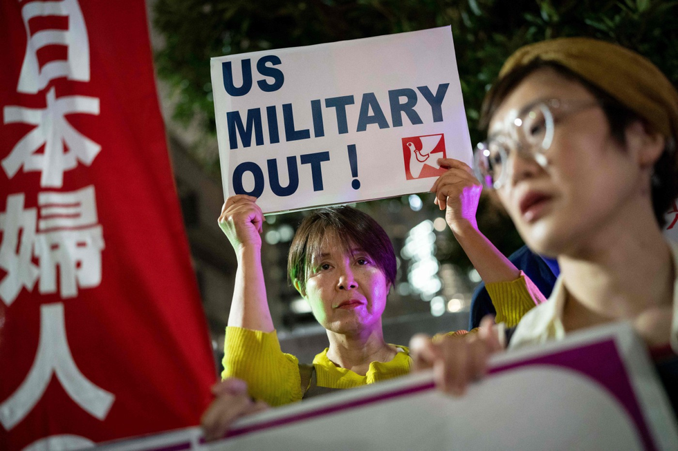 “美军滚出”AFP